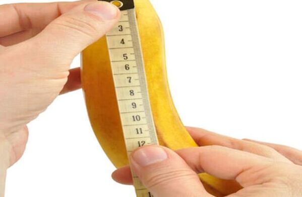 Measuring the penis before enlargement using a banana as an example